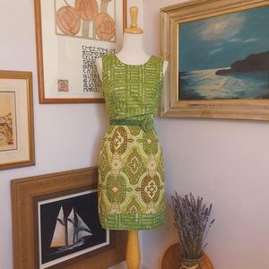 Green hand made fitted dress with yoga themed fabric